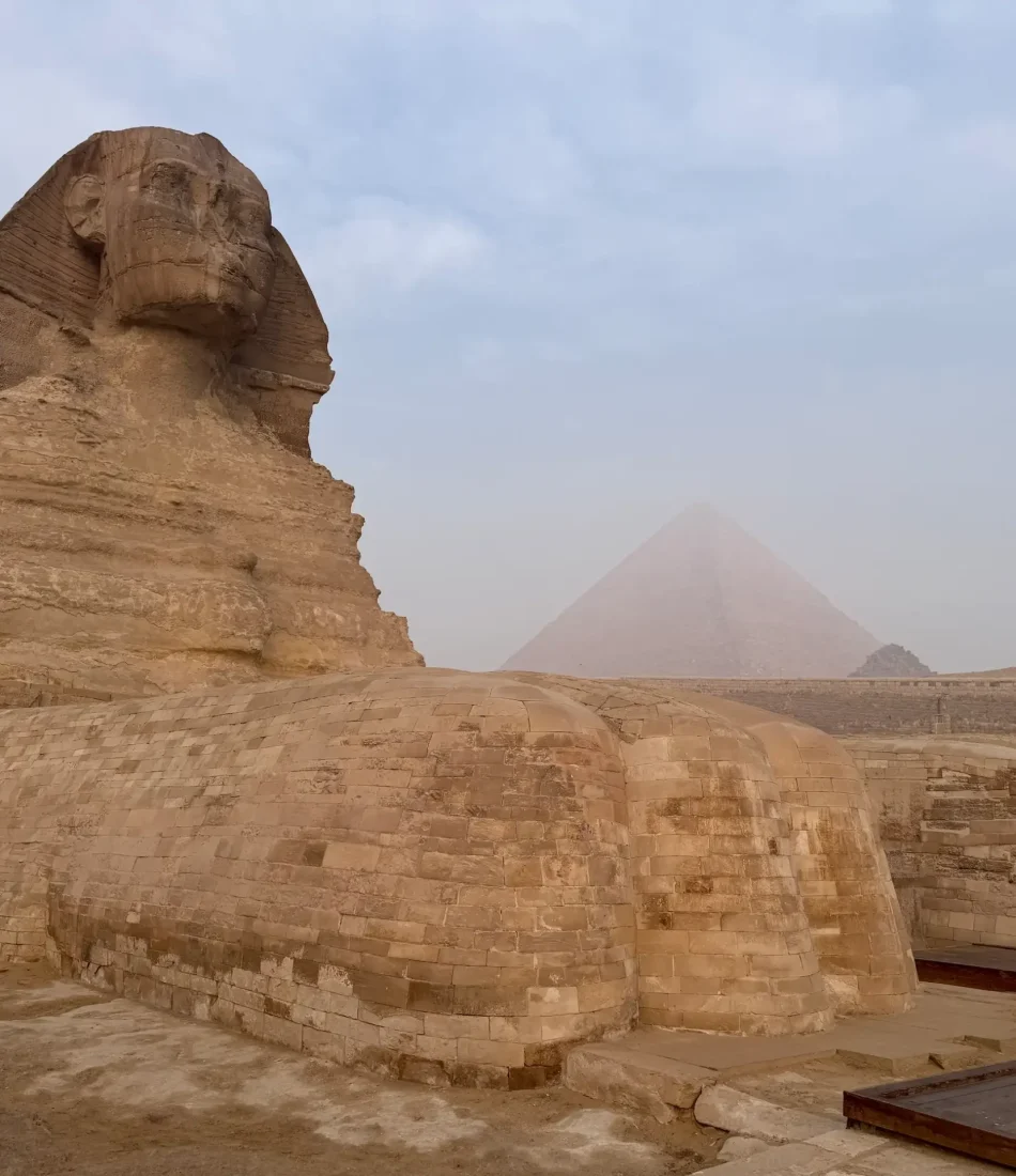 The Sphinx private visit in the morning with the Great Pyramid in the back ground